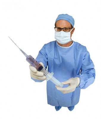 Doctor Holding Giant Syringe